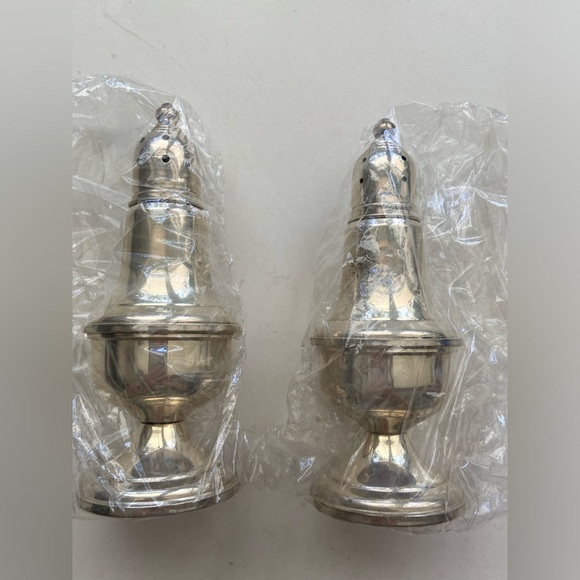 Vintage Empire Sterling weighted salt and pepper shakers marked 232
